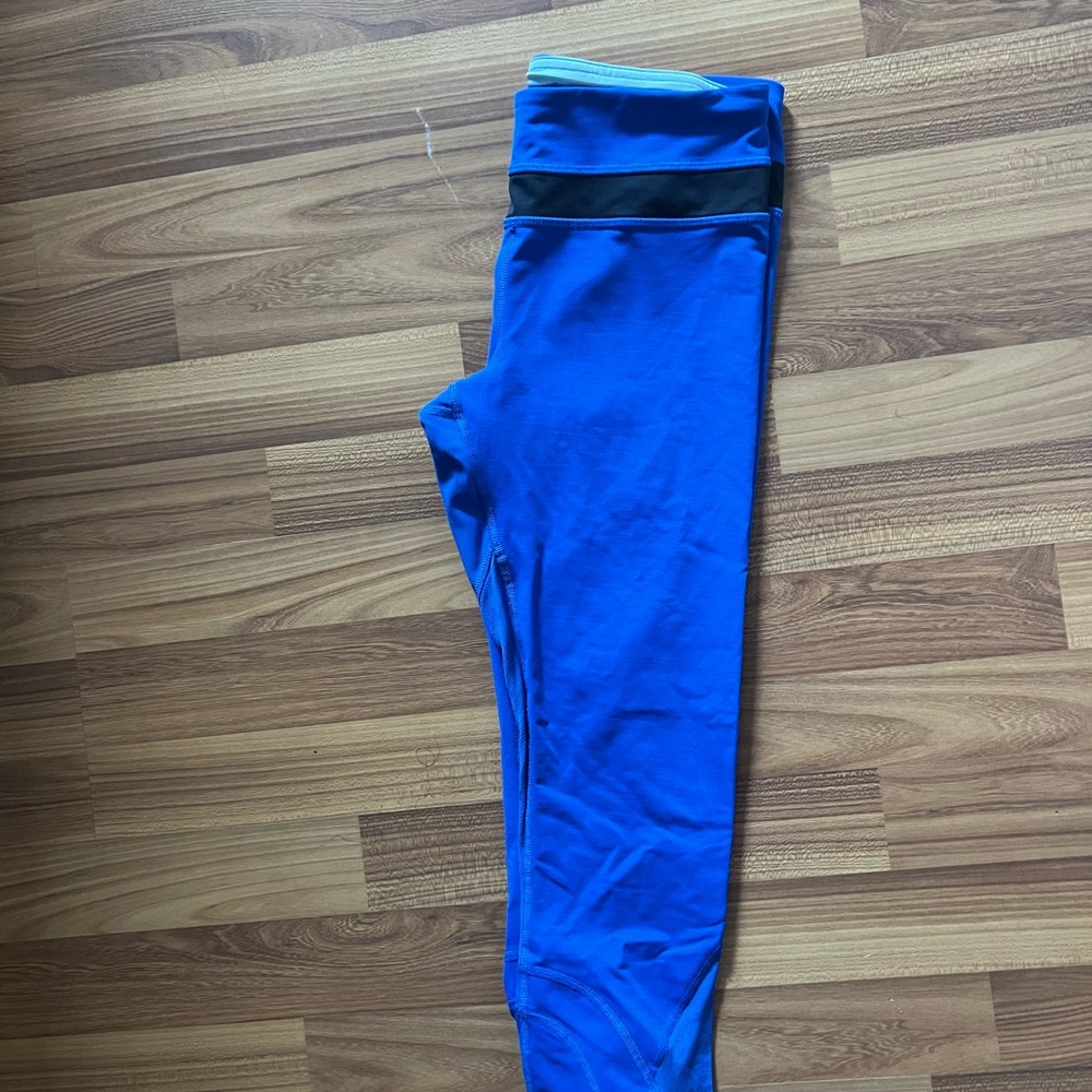 Lululemon Athletica Vibrant Blue Capris with Black Band